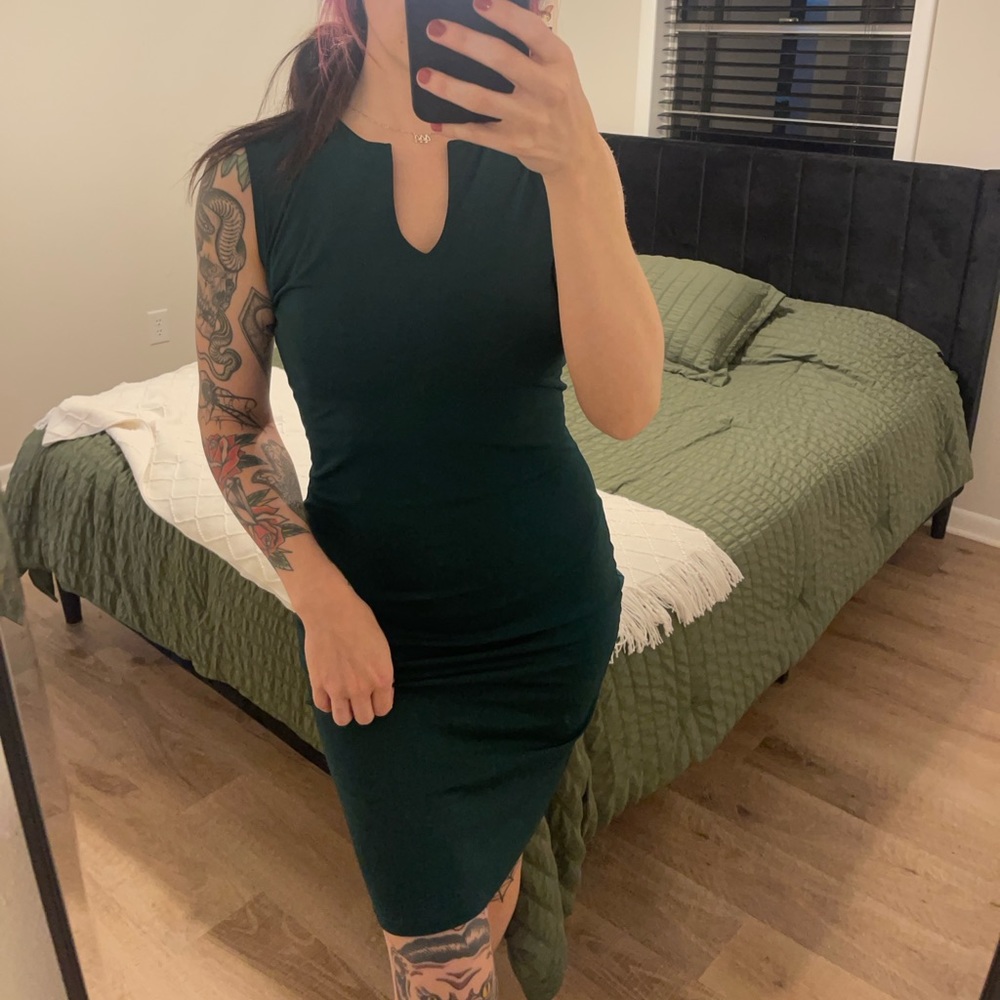 Super cute dark green fitted dress. Business casual or wedding!!